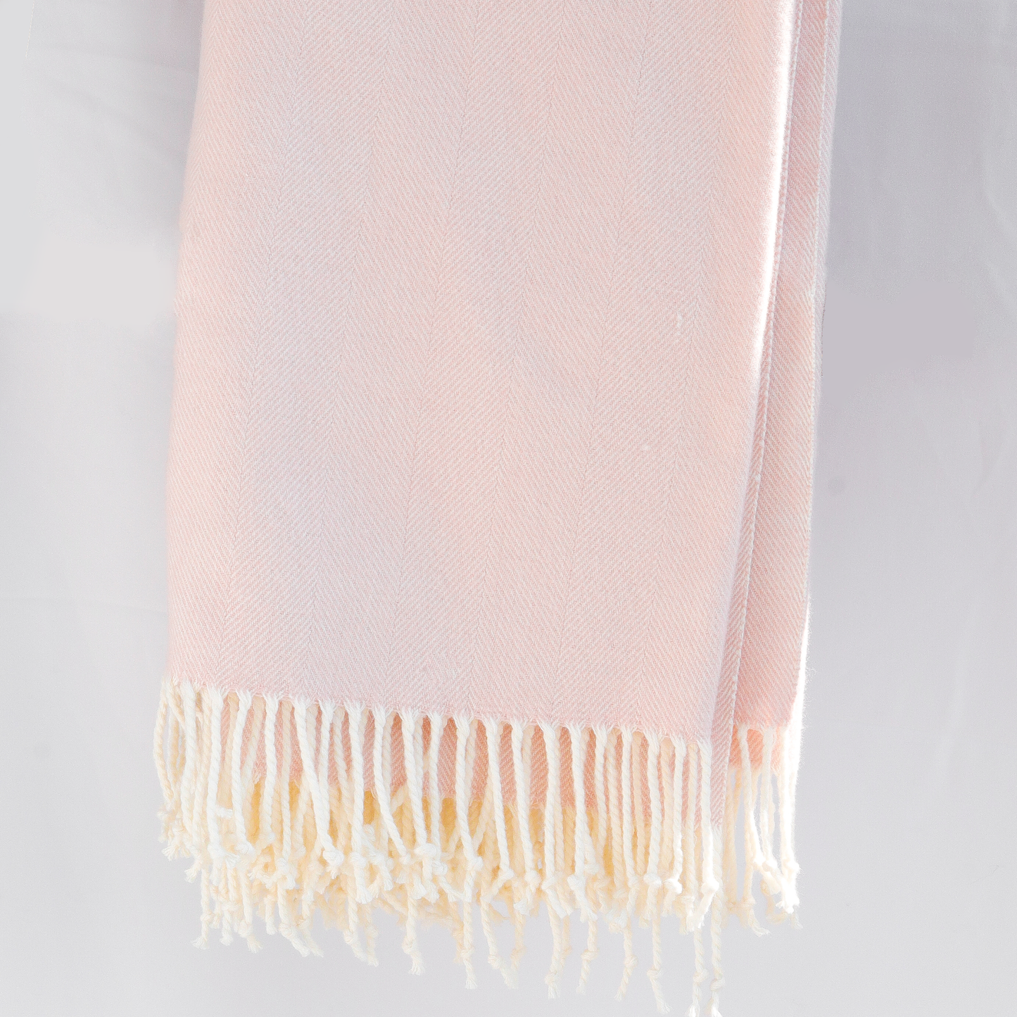 Alashan Adirondack Herringbone Throw Main Folded and Hung Rose Fine Linens